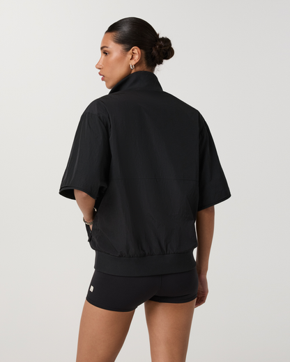 Retrograde Short Sleeve Half Zip Jacket | Black
